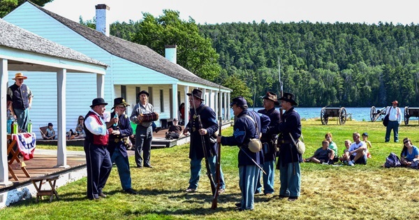 Costumed interpreters of Battery D 1st Michigan Light Artillery demonstrate military life of 1800s Fort Wilkins in Copper Harbor 